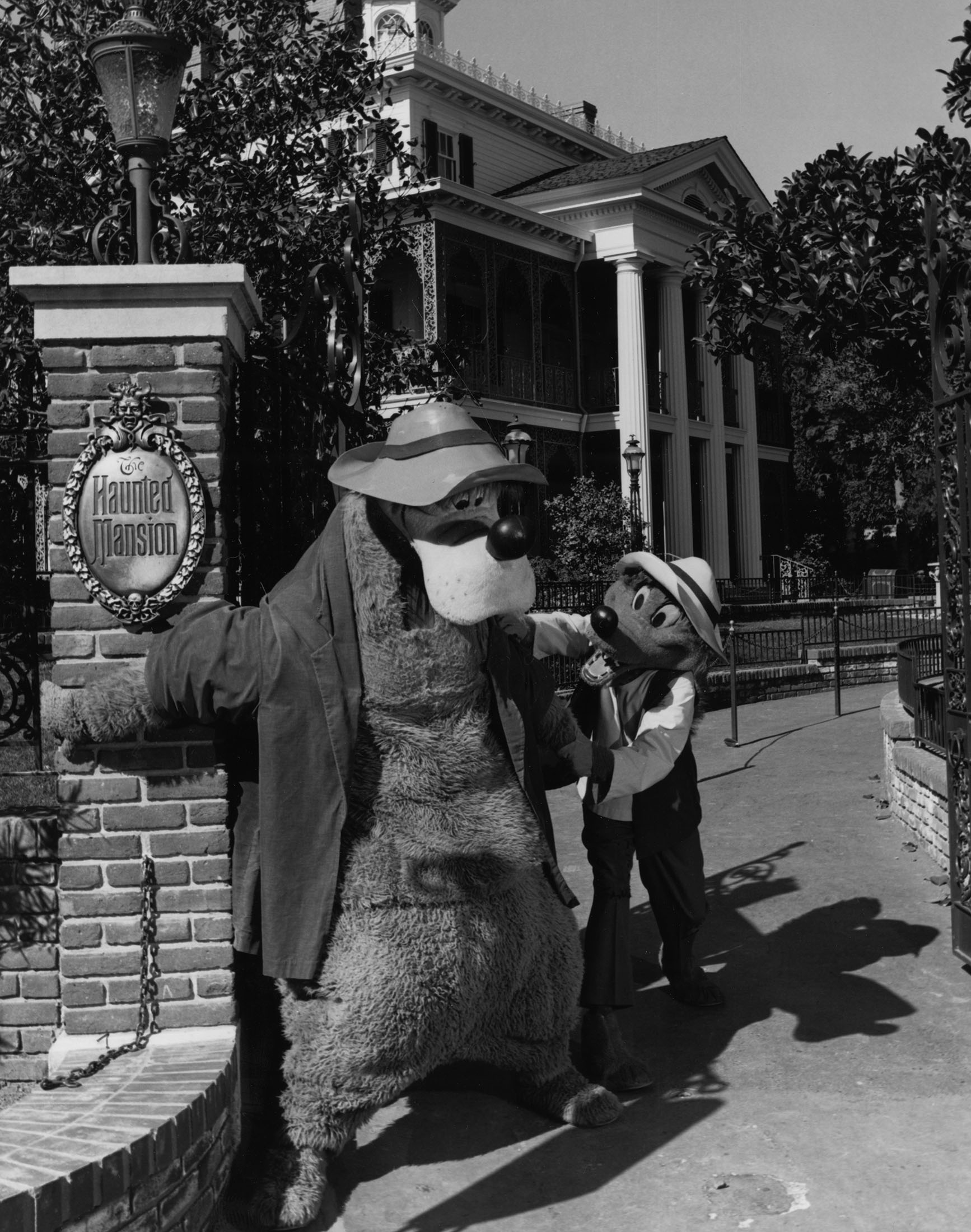 Br'er Bear and Br'er Fox outside the Haunted Mansion