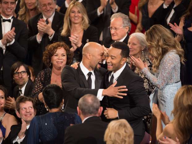 John Stephens (John Legend) and Lonnie Lynn (Common) accept the Oscar® for Achievement in music written for motion pictures (Original song) for work in “Selma”